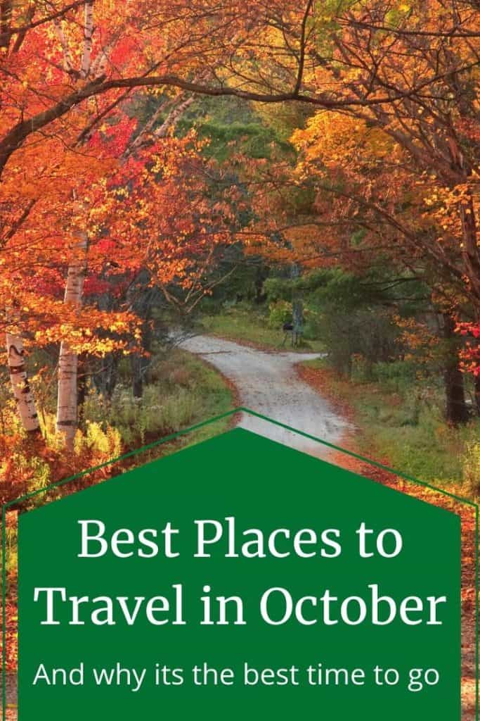 Best Places to Travel in October - a road winding through the forest with autumn leaves