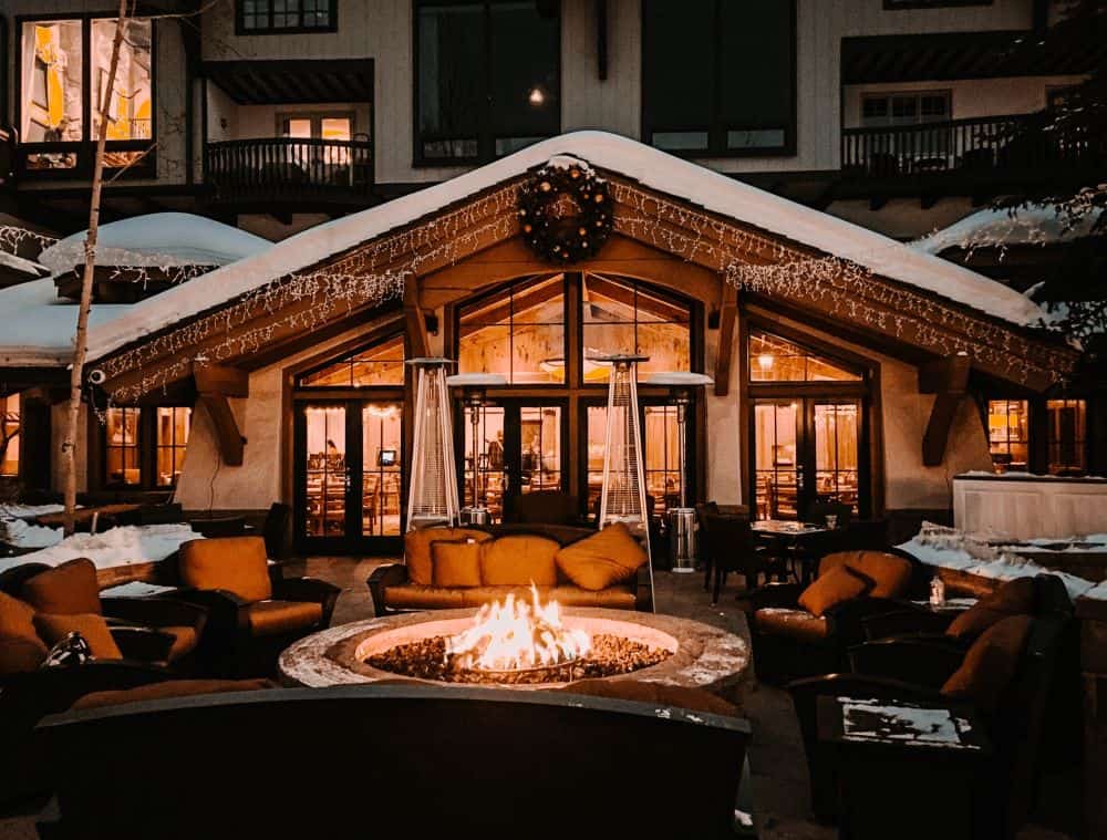Outdoor patio in winter with fire pit at Colorado resort