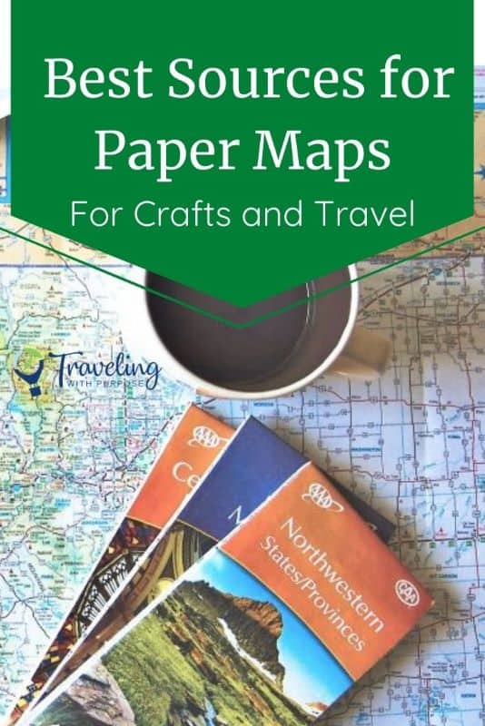 3 paper maps sitting on top of another map with a coffee cup next to them. Text says "Best sources for paper maps"