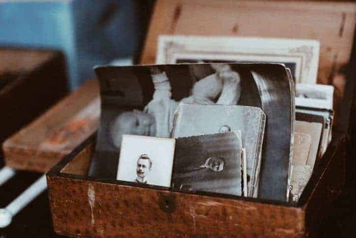 sort old photos in a box - things to do when quarantined