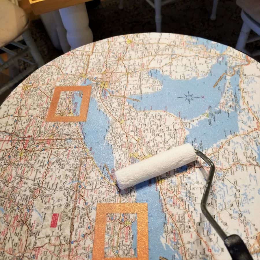 paint roller on map table