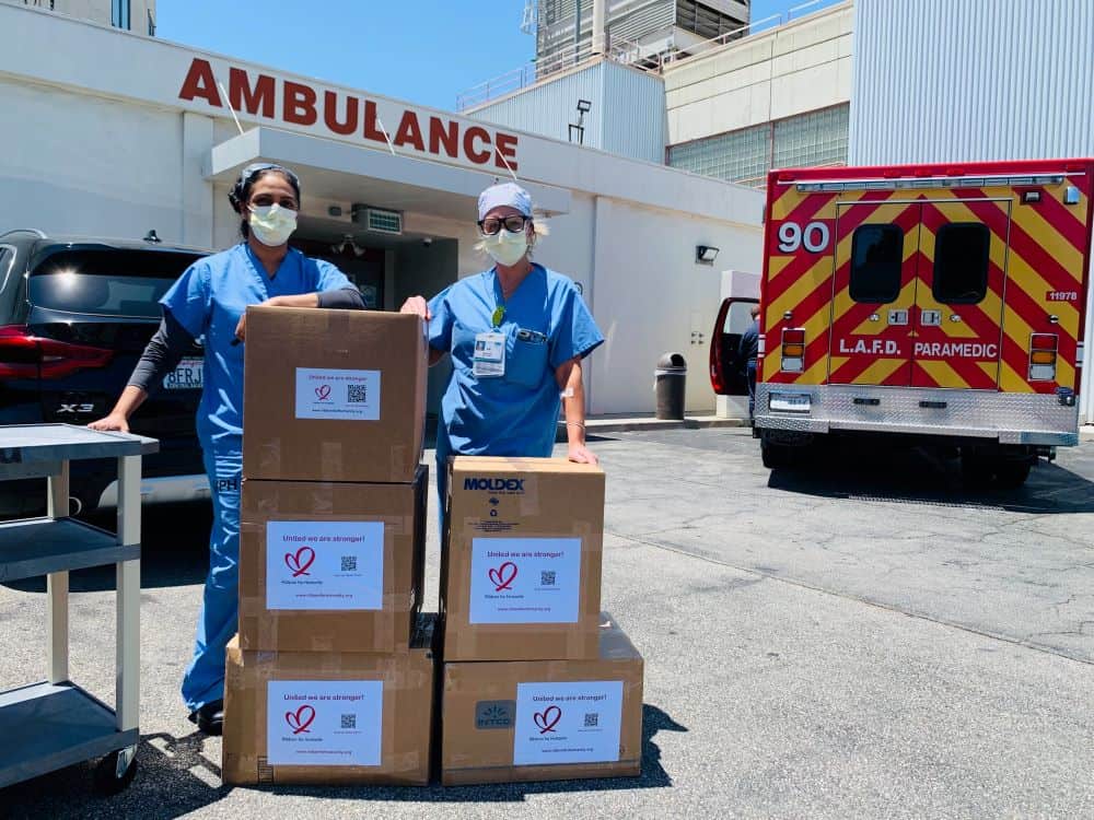 Medical Workers with PPE shipment by ambulance