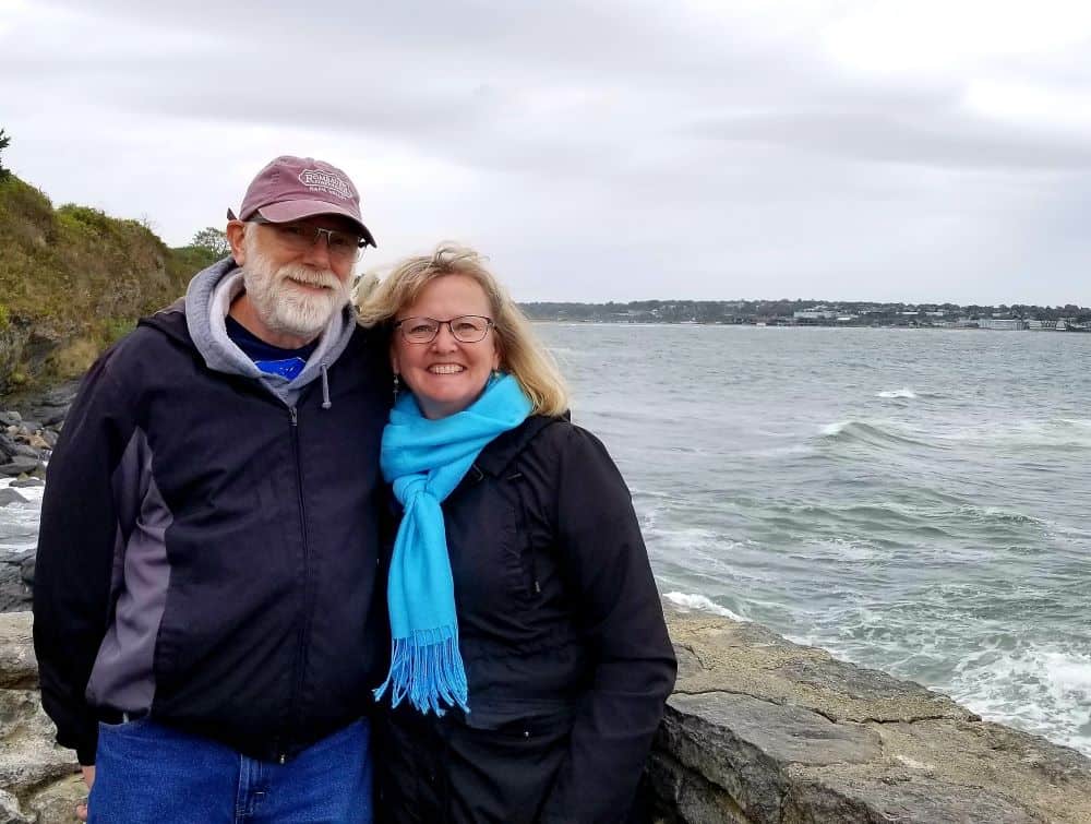 Terry and Nancy standing by the ocean in Newport, Rhode Island